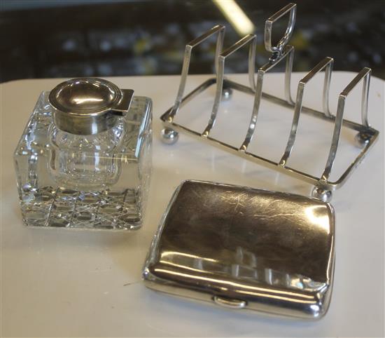 Inkwell, toast rack and cigarette case